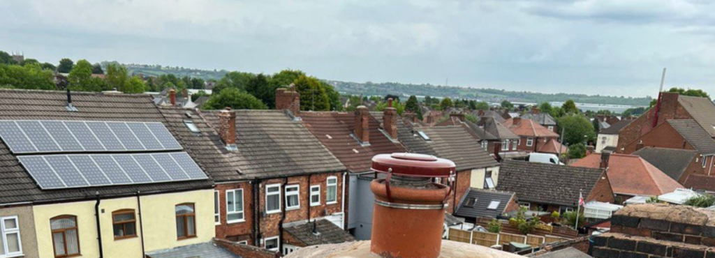 This is a photo taken from a roof which is being repaired by Newark on Trent Roofing Repairs, it shows a street of houses, and their roofs